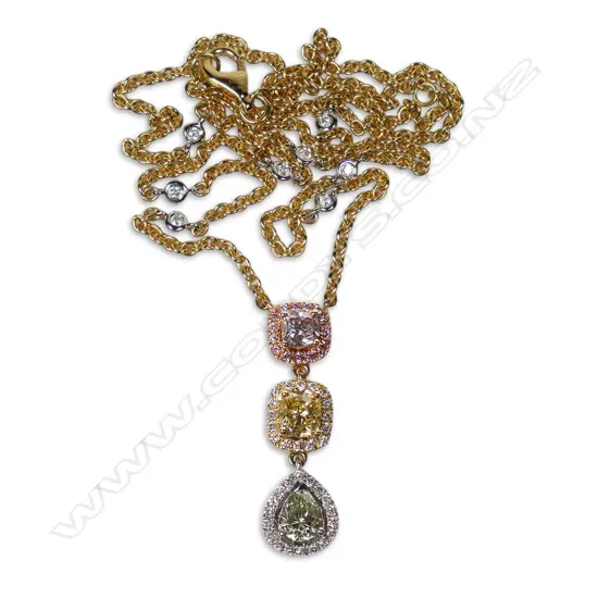 An 18ct white rose and yellow gold diamond drop necklace,