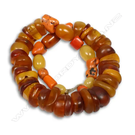 A graduated antique amber bead necklace,