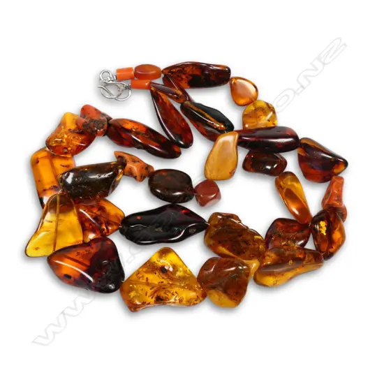 An old Baltic amber polished double strand bead necklace,