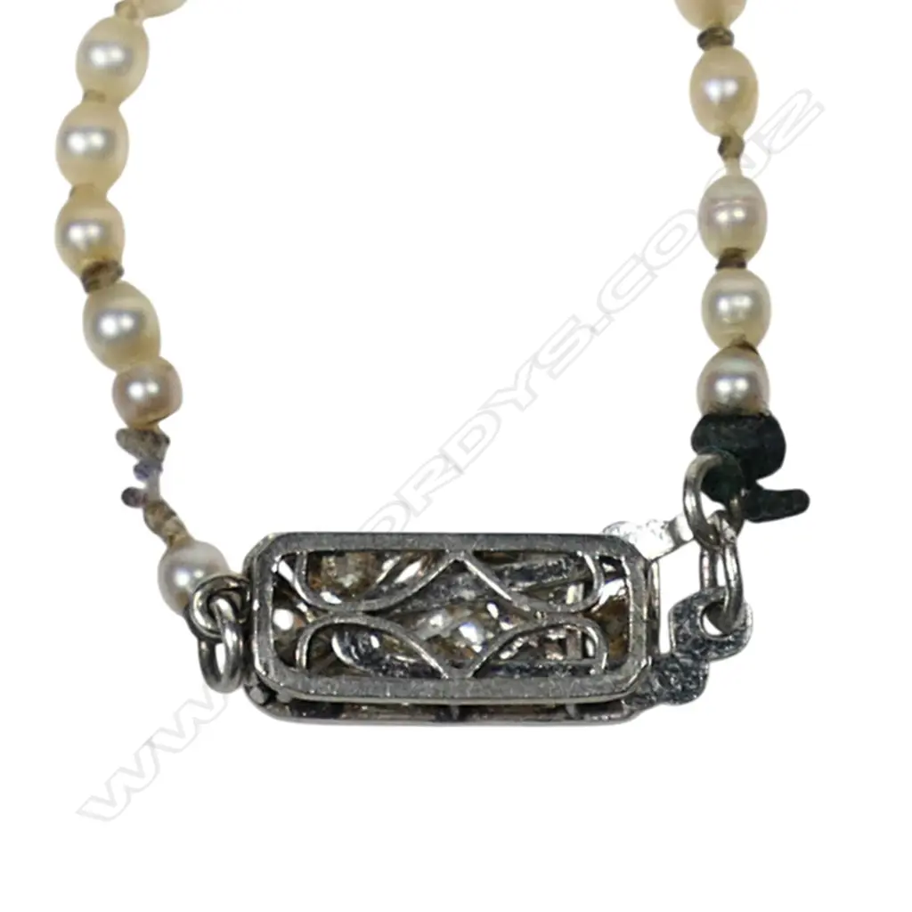 A natural pearl single strand necklace, Image 1++