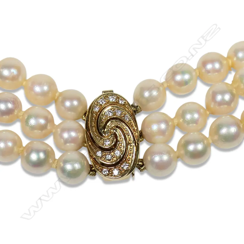 A 14ct gold diamond and pearl bracelet, Image 1++