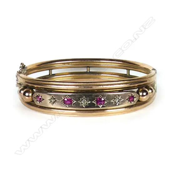 A 9ct gold Edwardian ruby and diamond bangle,