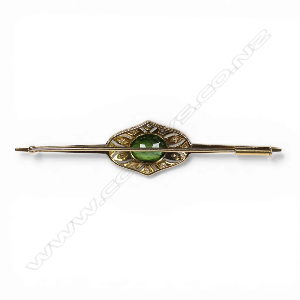 An 18ct gold and platinum Art Deco diamond and tourmaline bar brooch, Image 1++