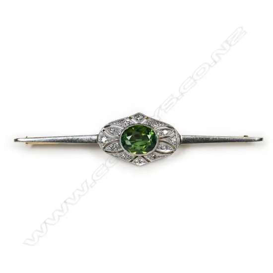 An 18ct gold and platinum Art Deco diamond and tourmaline bar brooch,