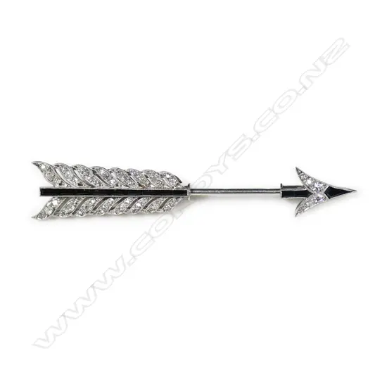 An Art Deco diamond and onyx jabot arrow,