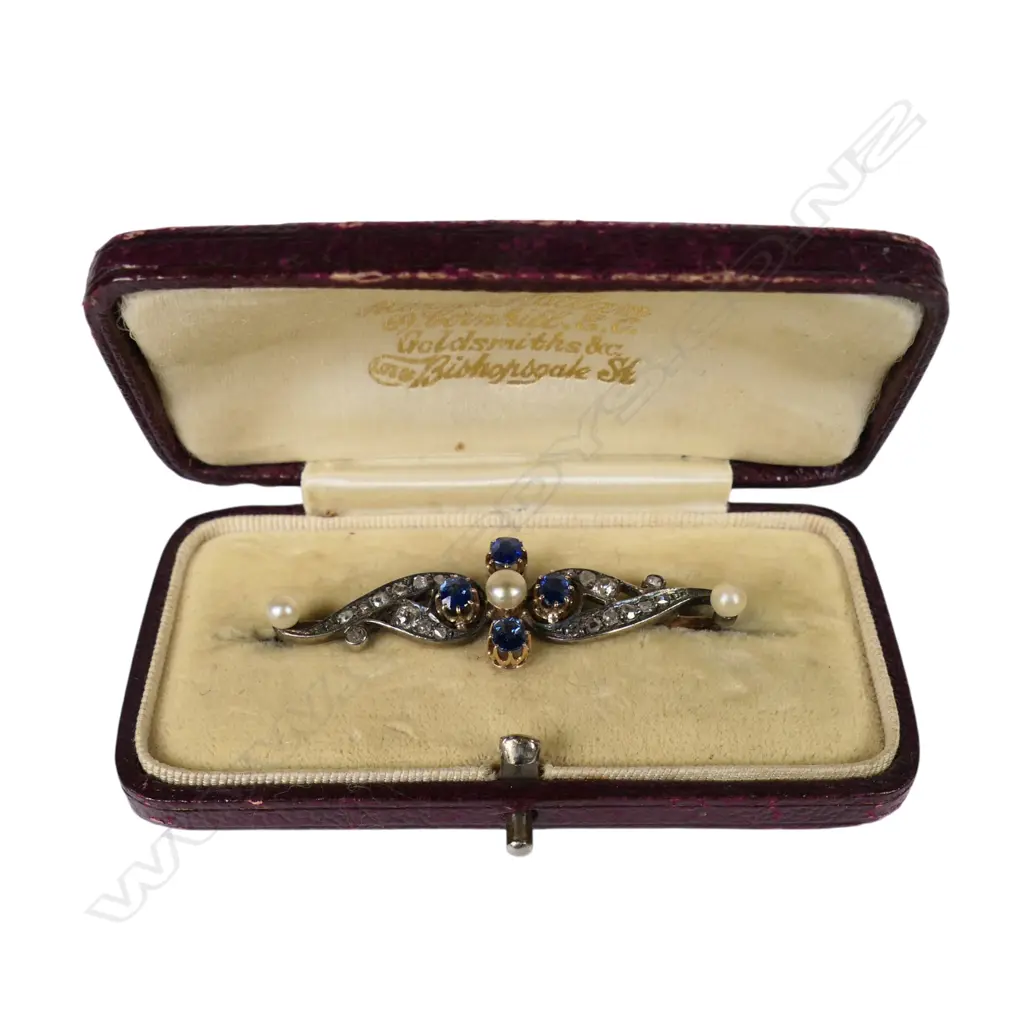 An 8ct gold and silver diamond sapphire and pearl brooch, Image 1++