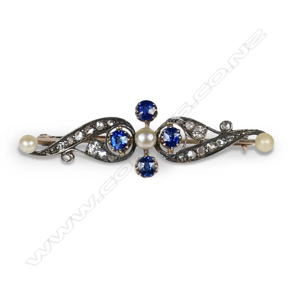 An 8ct gold and silver diamond sapphire and pearl brooch, Image 1++