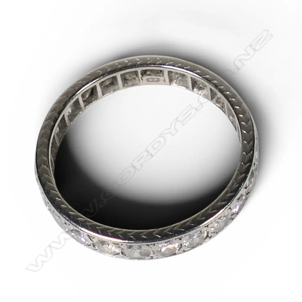 A quality early 20thC platinum and diamond eternity band, Image 1++