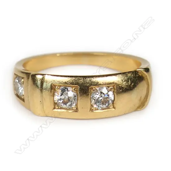 An 18ct gold and diamond buckle style ring,