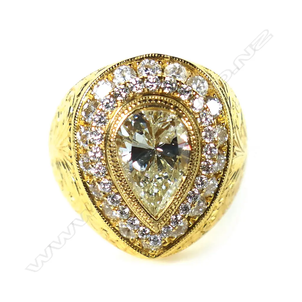 A large 18ct yellow gold yellow pear cut diamond and diamond cluster ring, Image 1++