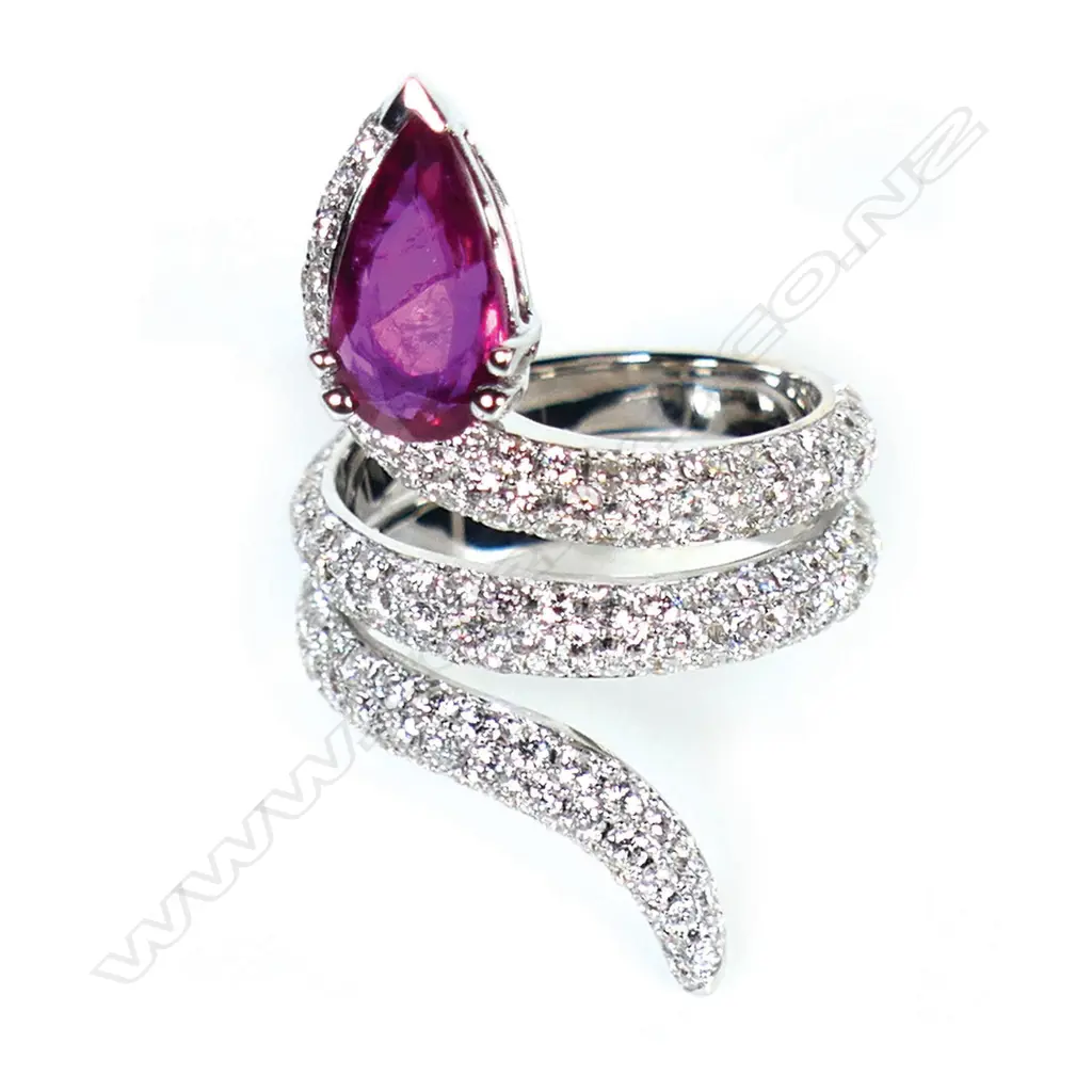 An 18ct white gold ruby and multi diamond snake ring, Image 1++