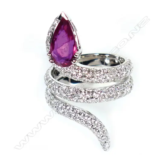 An 18ct white gold ruby and multi diamond snake ring,