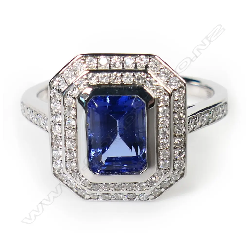 A 14ct white gold tanzanite and diamond double halo ring, Image 1++
