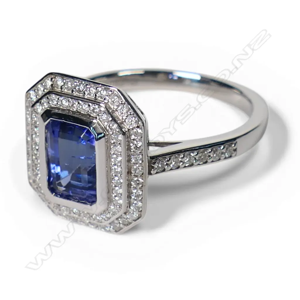 A 14ct white gold tanzanite and diamond double halo ring, Image 1++