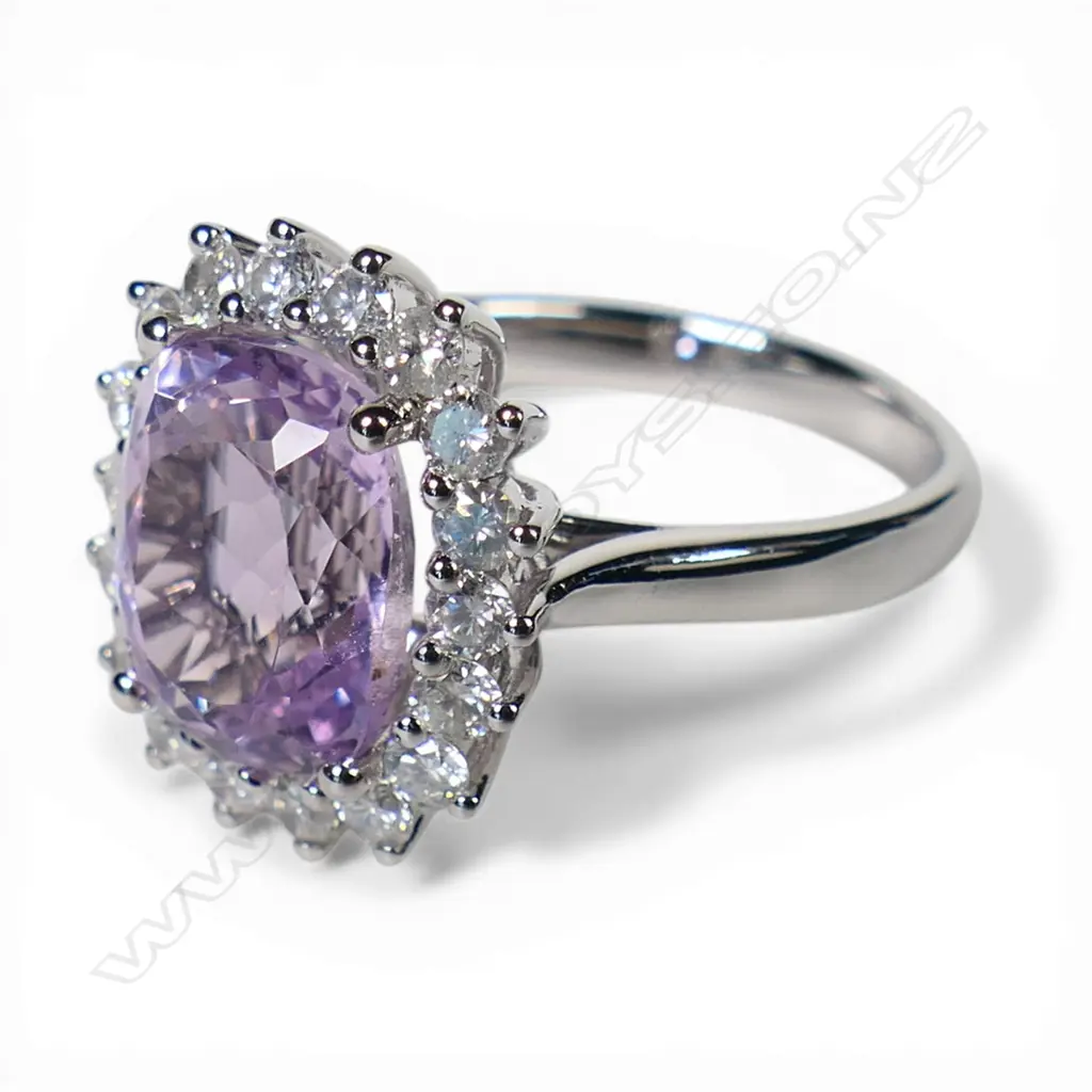 A 14ct white gold kunzite and diamond halo ring, Image 1++