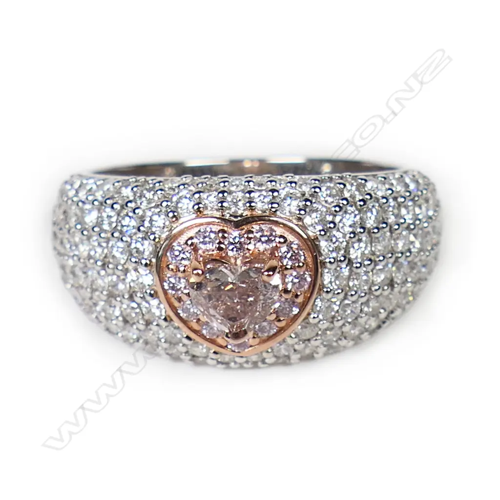 A 14ct white and rose gold diamond cluster ring, Image 1++