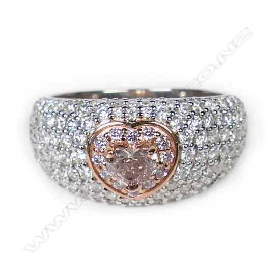 A 14ct white and rose gold diamond cluster ring,