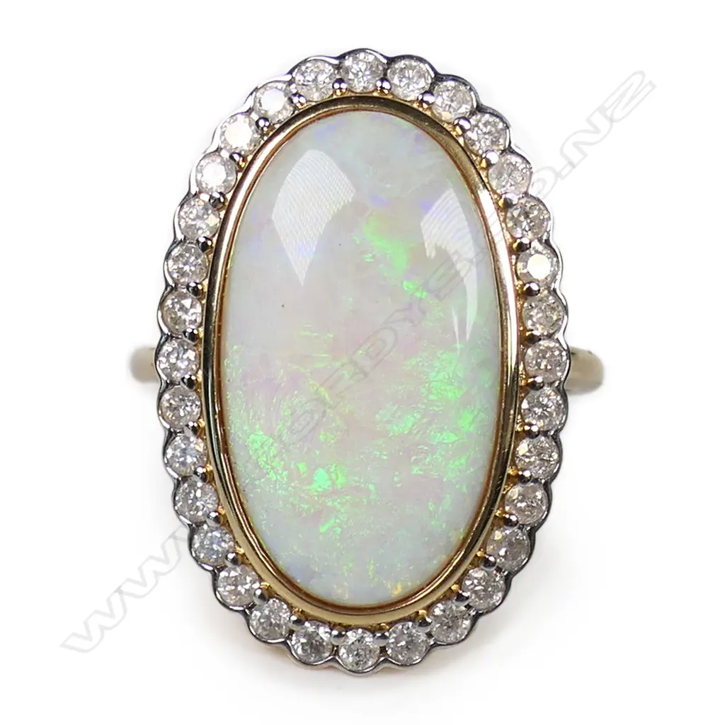 A 14ct gold opal and diamond ring, Image 1++