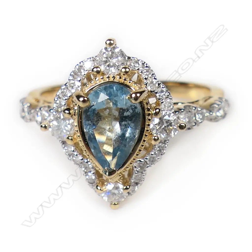 A 14ct gold aquamarine and diamond dress ring, Image 1++