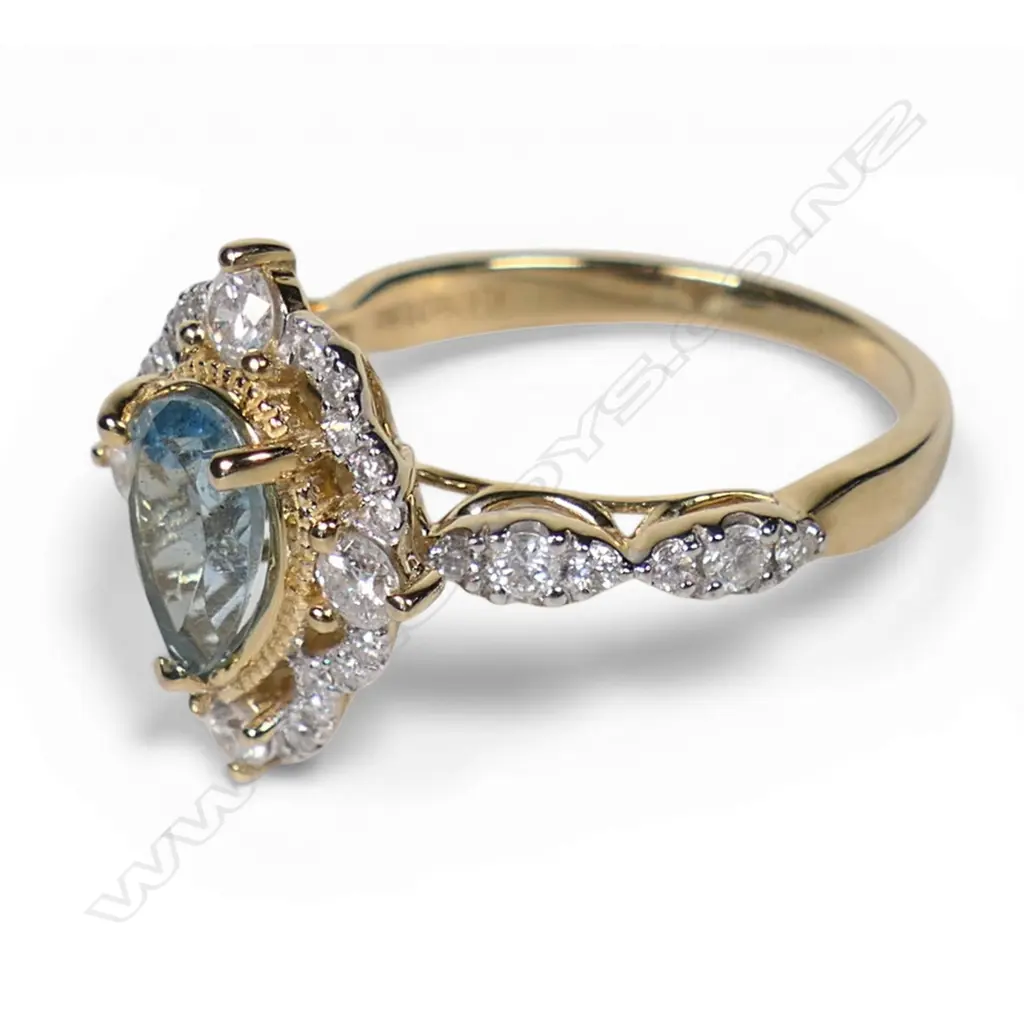 A 14ct gold aquamarine and diamond dress ring, Image 1++