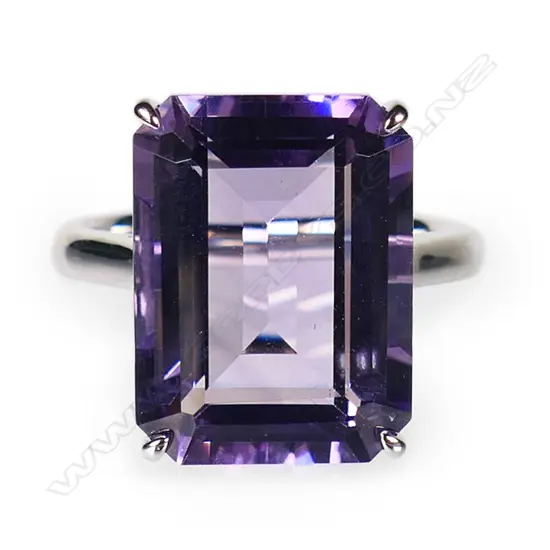 A 9ct white gold and amethyst ring,