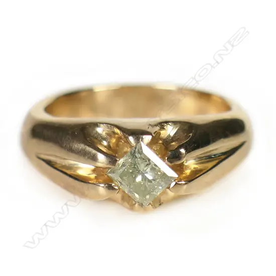 A Simon Misdale 9ct gold gypsy set diamond ring,