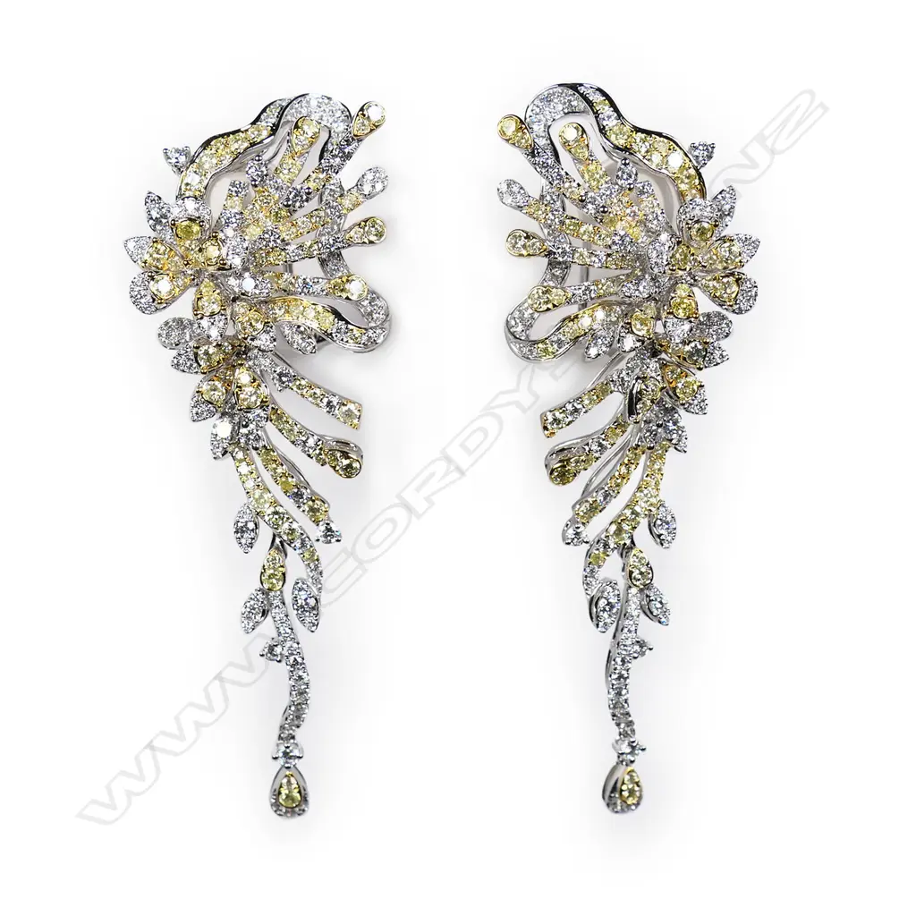 A pair of 18ct white gold yellow and white diamond earrings, Image 1++