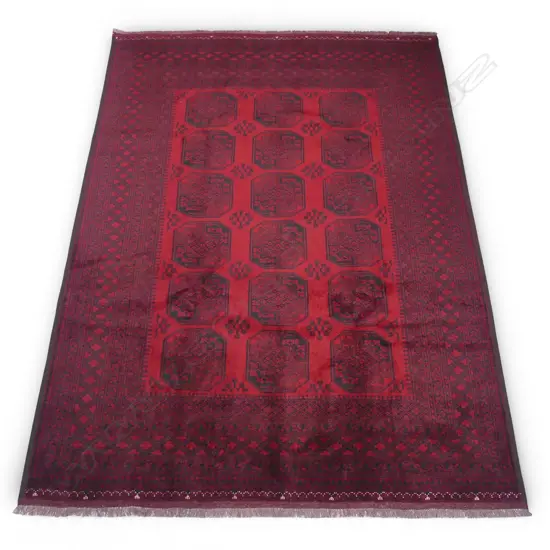 A good Afghan hand-knotted elephant foot carpet,