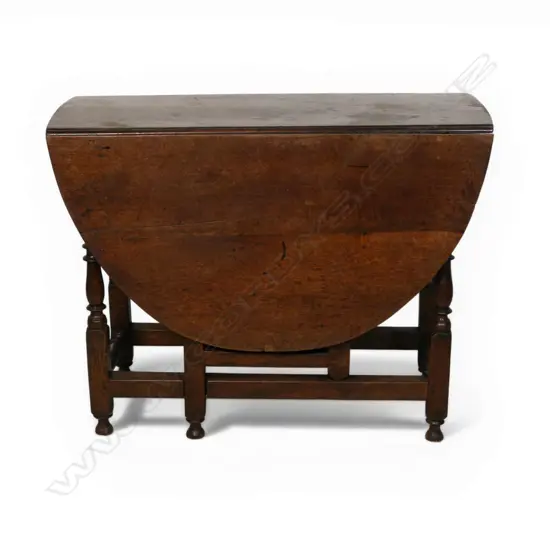 A Georgian country oak gate leg table,