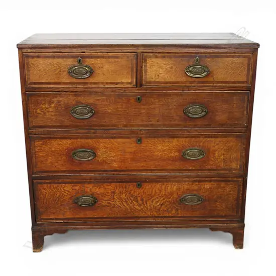 A Georgian oak flat front chest,