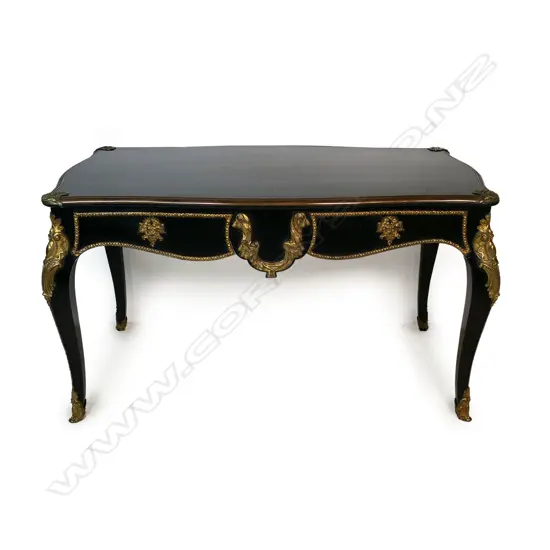 A 20thC French style bureau plat,