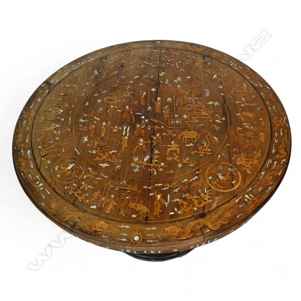 An impressive antique Chinese dining table the round top inlaid with multiple courtyard scenes, bamboo, willow trees, clouds, phoenix birds, etc, Image 1++