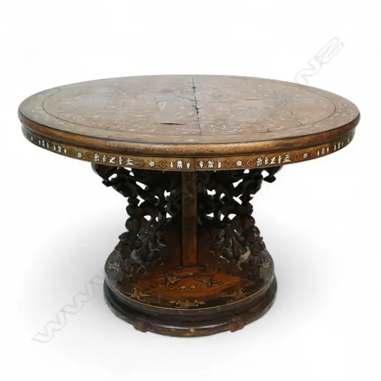 An impressive antique Chinese dining table the round top inlaid with multiple courtyard scenes, bamboo, willow trees, clouds, phoenix birds, etc,