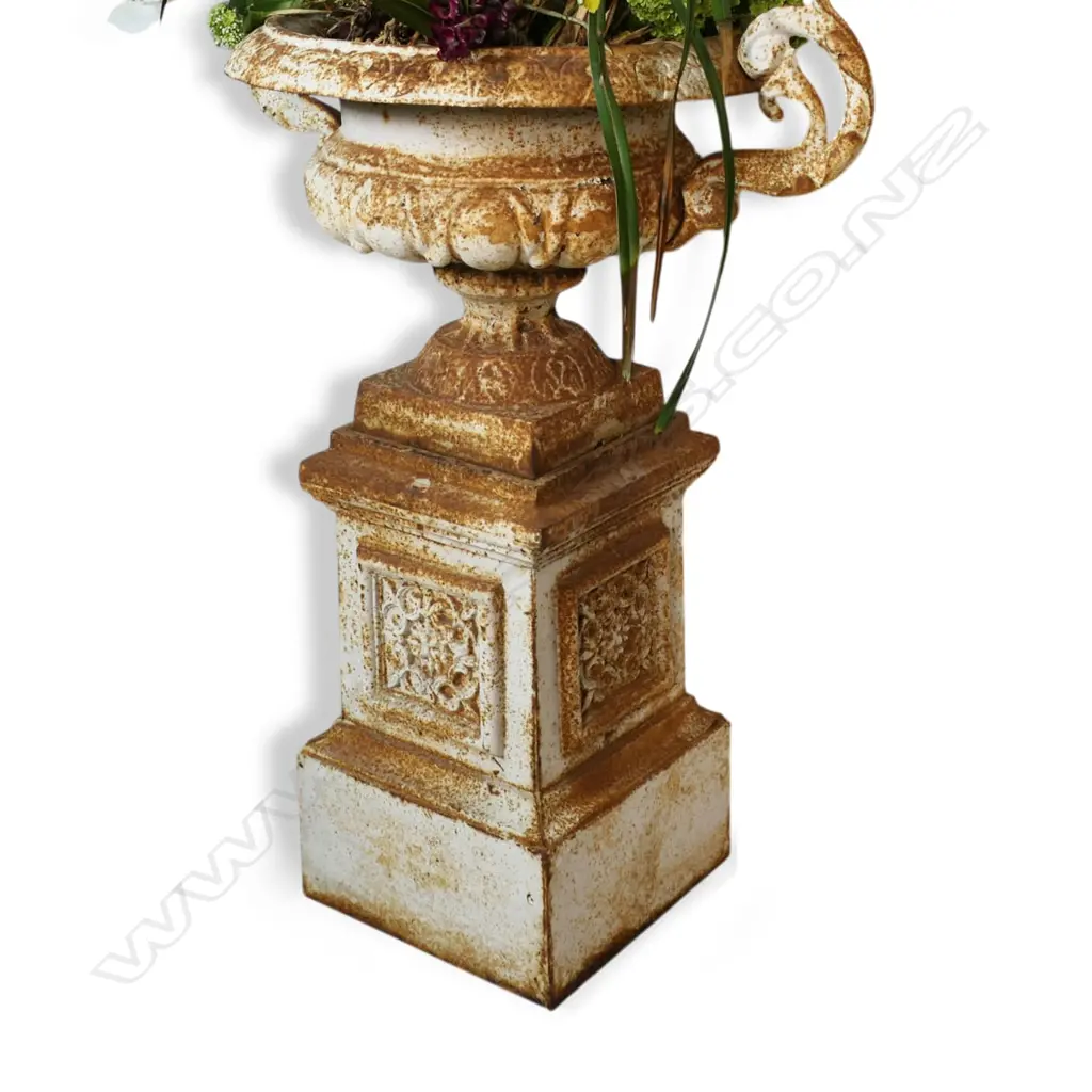A pair of vintage cast iron garden urns on plinth bases, Image 1++