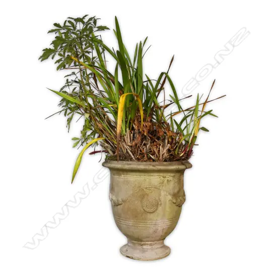 A vintage concrete Versailles style garden urn,