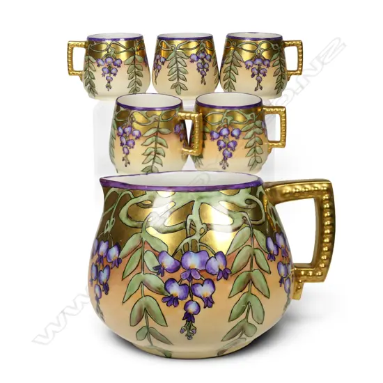 Early 20thC La Porcelaine Limousine (Limoge) Art Nouveau cider jug and five cup set,