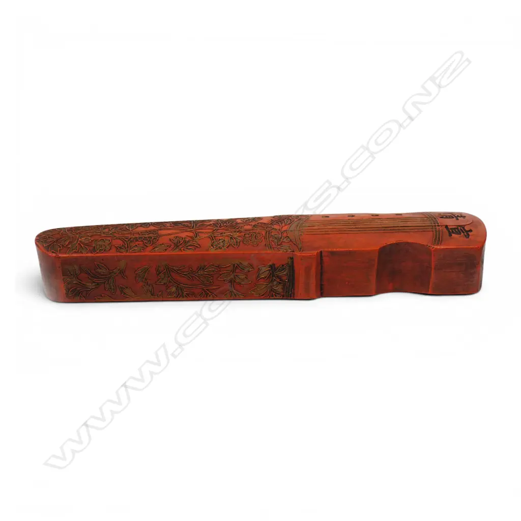 A Chinese red inkstone modelled as a guqin, Image 1++