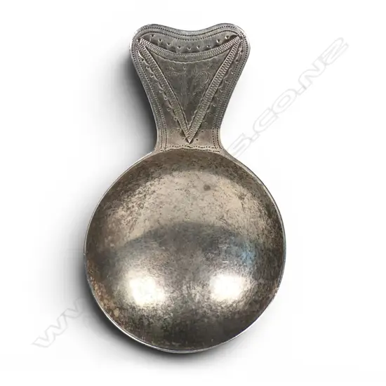A George III silver caddy spoon,