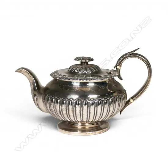 A George IV period silver teapot,