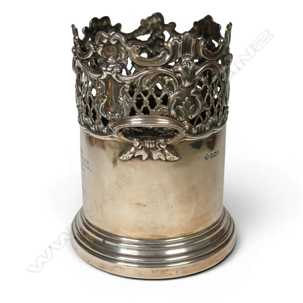 An Edwardian uncommon silver large bottle coaster, Image 1++