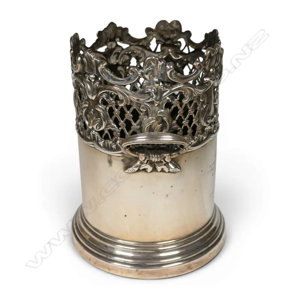 An Edwardian uncommon silver large bottle coaster, Image 1++