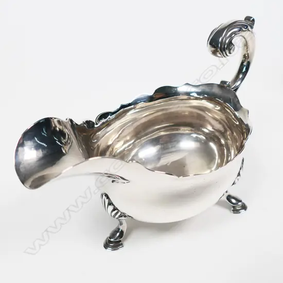 A pair of early George III silver sauce boats,