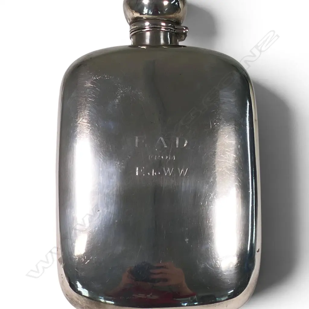 An impressive and large Victorian sterling silver hip flask, Image 1++