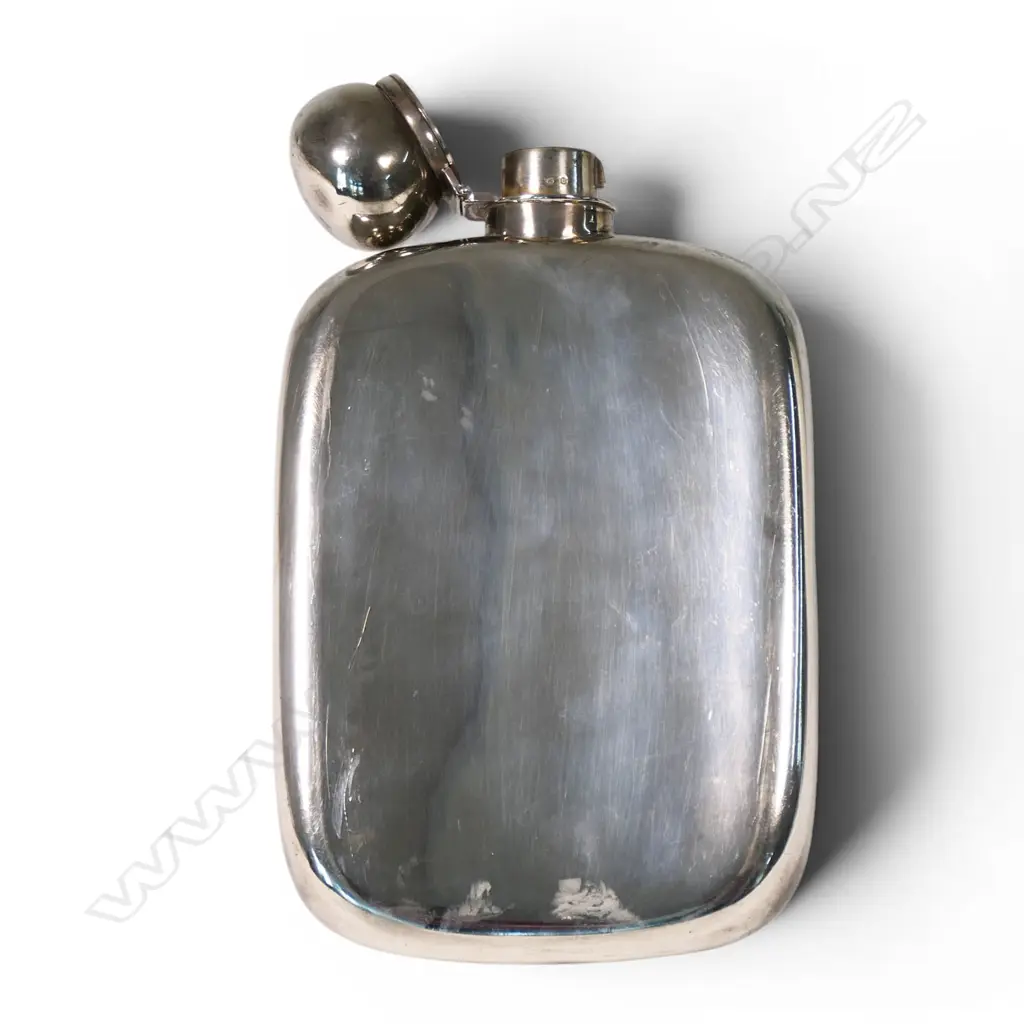 An impressive and large Victorian sterling silver hip flask, Image 1++