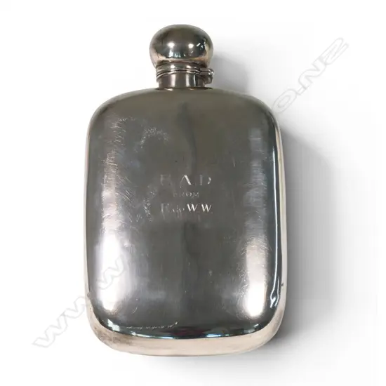 An impressive and large Victorian sterling silver hip flask,