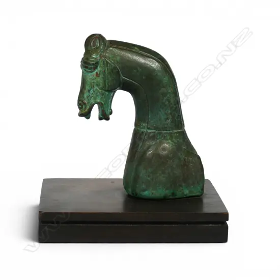 A patinated bronze horse head,