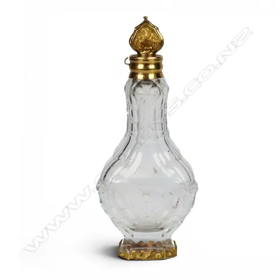 A 19thC quality gold and cut glass perfume bottle,