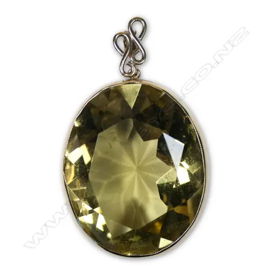 A large vintage 9ct gold and citrine pendant,