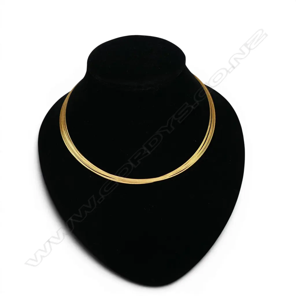 A 9ct gold multi-strand necklet, Image 1++