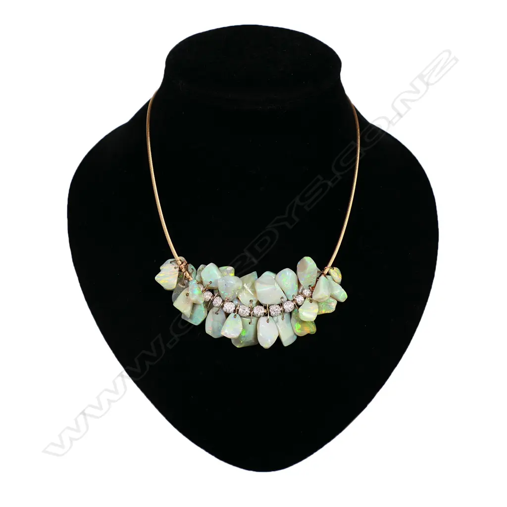 An 18ct gold opal and diamond necklace, Image 1++